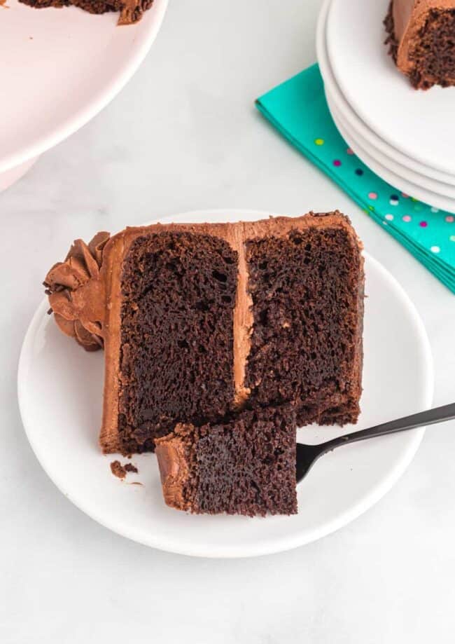 a slice of cake made with doctored chocolate cake mix