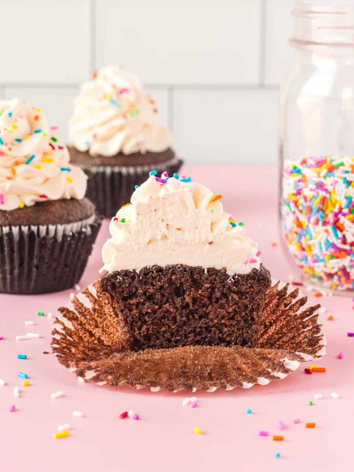 a cupcake with frosting and sprinkles.