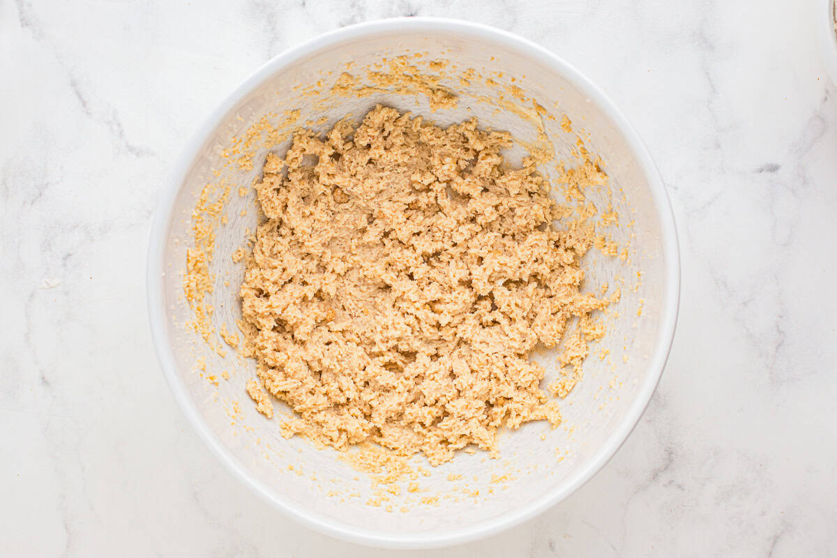 creamed butter and sugar in a white bowl