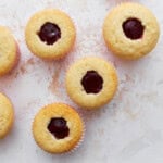 Cupcakes with the center removed and replaced with berry filling.