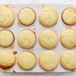 Baked cupcakes in a cupcake tin.