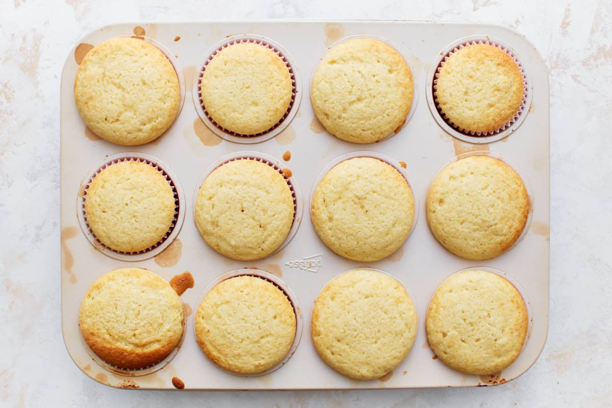 Baked cupcakes in a cupcake tin.