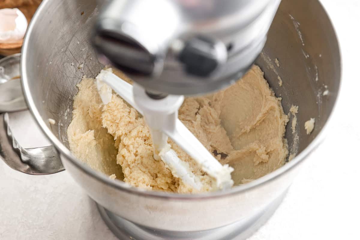 Mixing cookie dough in a stand mixer.