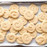 A baking tray full of butter cookies.