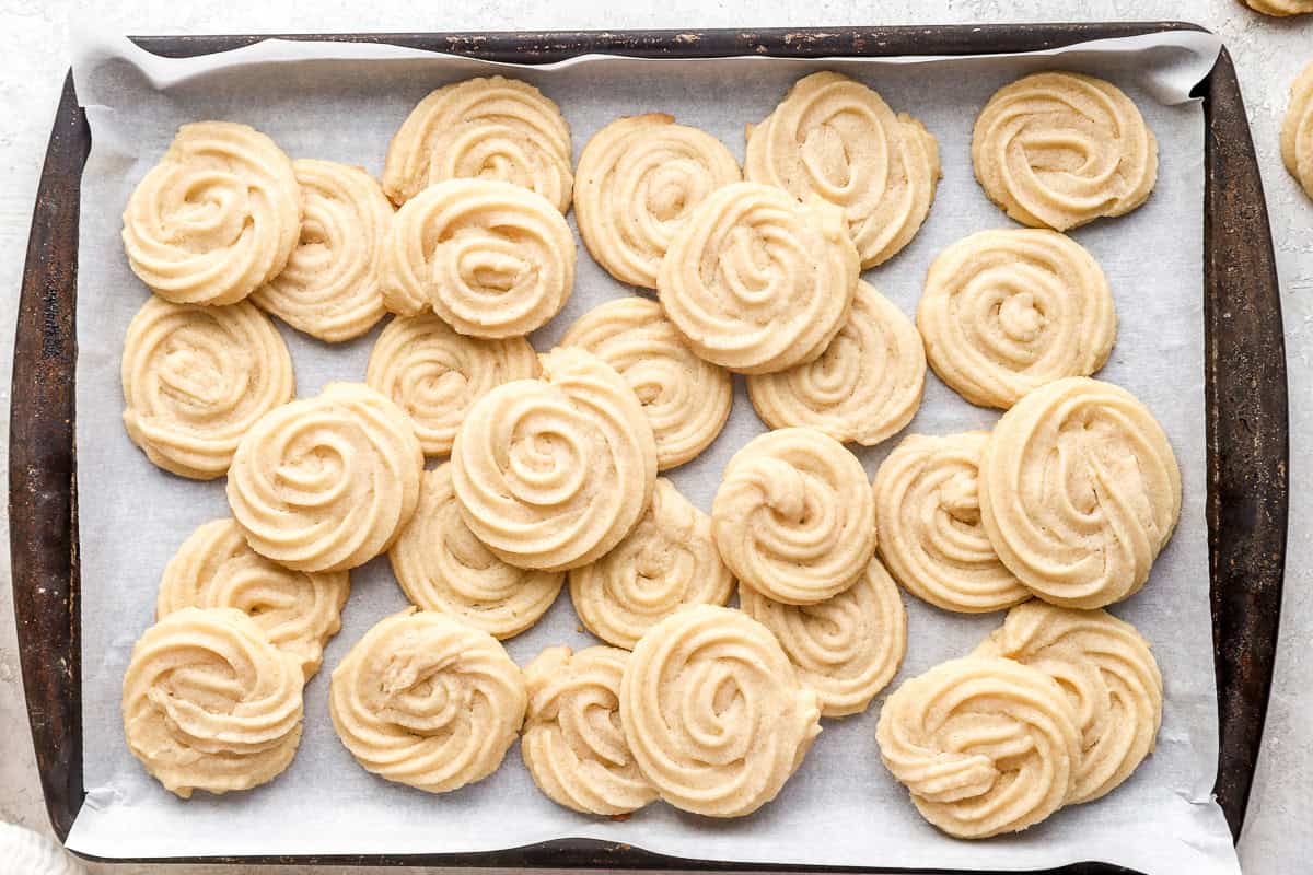 A baking tray full of butter cookies.