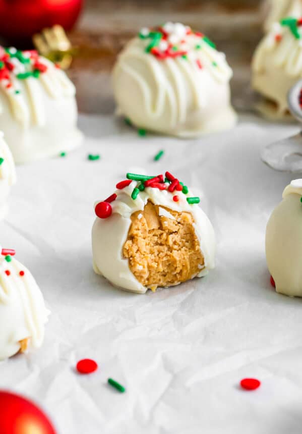 a partially eaten white chocolate peanut butter ball.