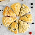 flavored baked homemade american-style scones arranged in a circle.