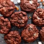 overhead view of rocky road cookies on a wire baking rack.