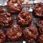 overhead view of baked rocky road cookies on a wire cooling rack.