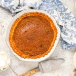 baked vinegar pie in a white pie pan.