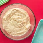 peppermint cake batter in a glass bowl.