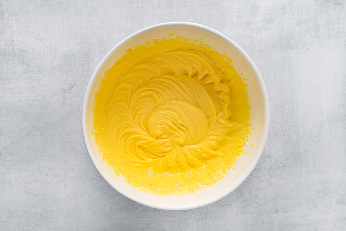 banana pudding mixture in a white bowl.