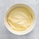 whipped banana pudding mixture in a white bowl.