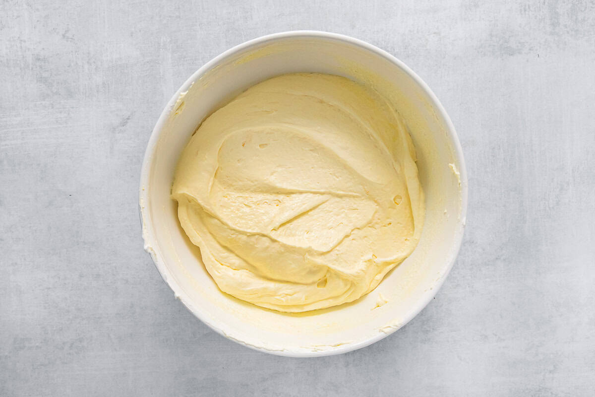 whipped banana pudding mixture in a white bowl.