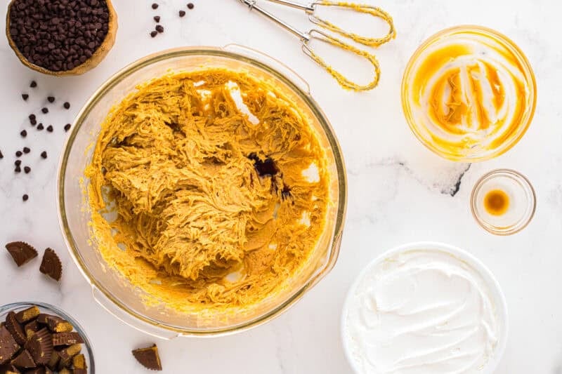 beaten cream cheese, marshmallow creme, and peanut butter in a glass bowl.