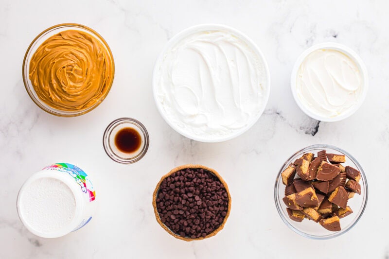 portioned ingredients for peanut butter fluff in individual containers.