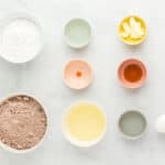 measured ingredients for creme egg brownies in individual bowls.