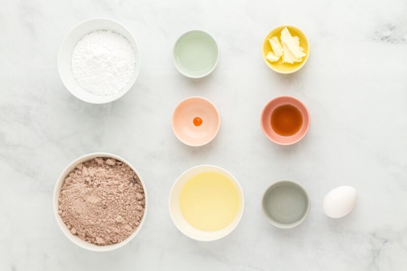 measured ingredients for creme egg brownies in individual bowls.