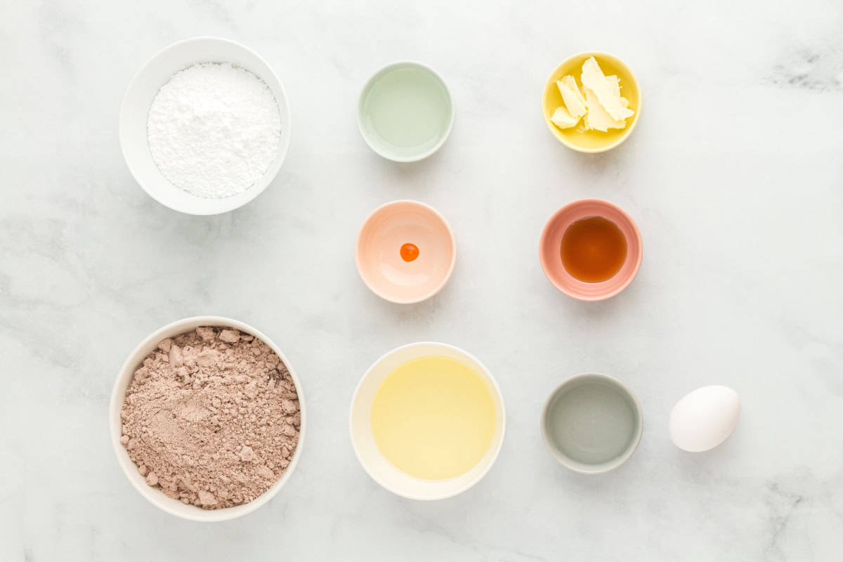 measured ingredients for creme egg brownies in individual bowls.