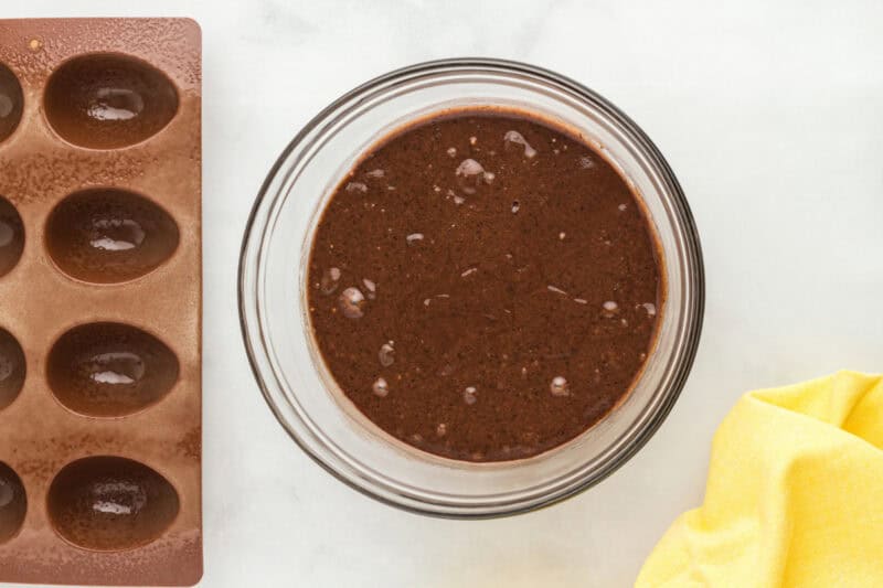 brownie batter in a glass bowl.