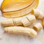 Two bananas chopped into pieces.