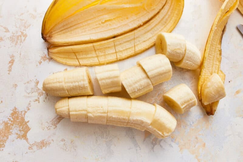 Two bananas chopped into pieces.