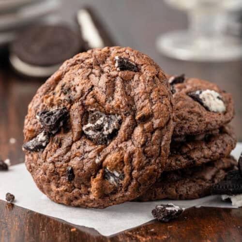 Four oreo brownie mix cookies stacked on top of each other.