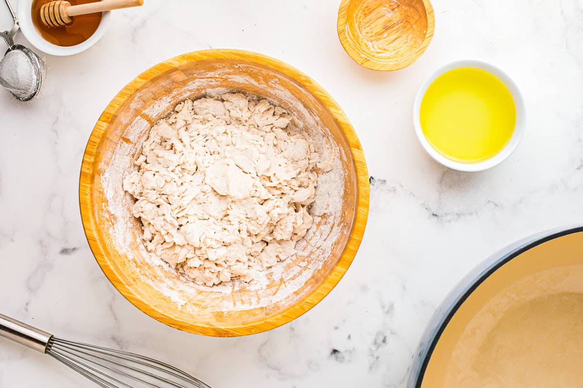 Shortening being cut into the dry ingredients.