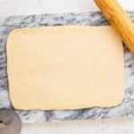 Dough rolled out flat.