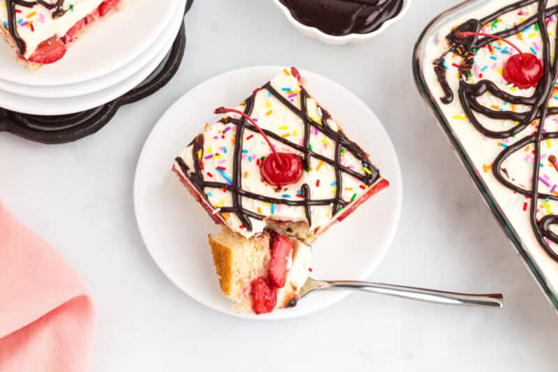 A slice of banana split sundae cake.