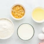 Bowls of cake mix, mashed bananas, oil, and melted ice cream.