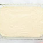 Cake batter in a 9x13 rectangle pan.