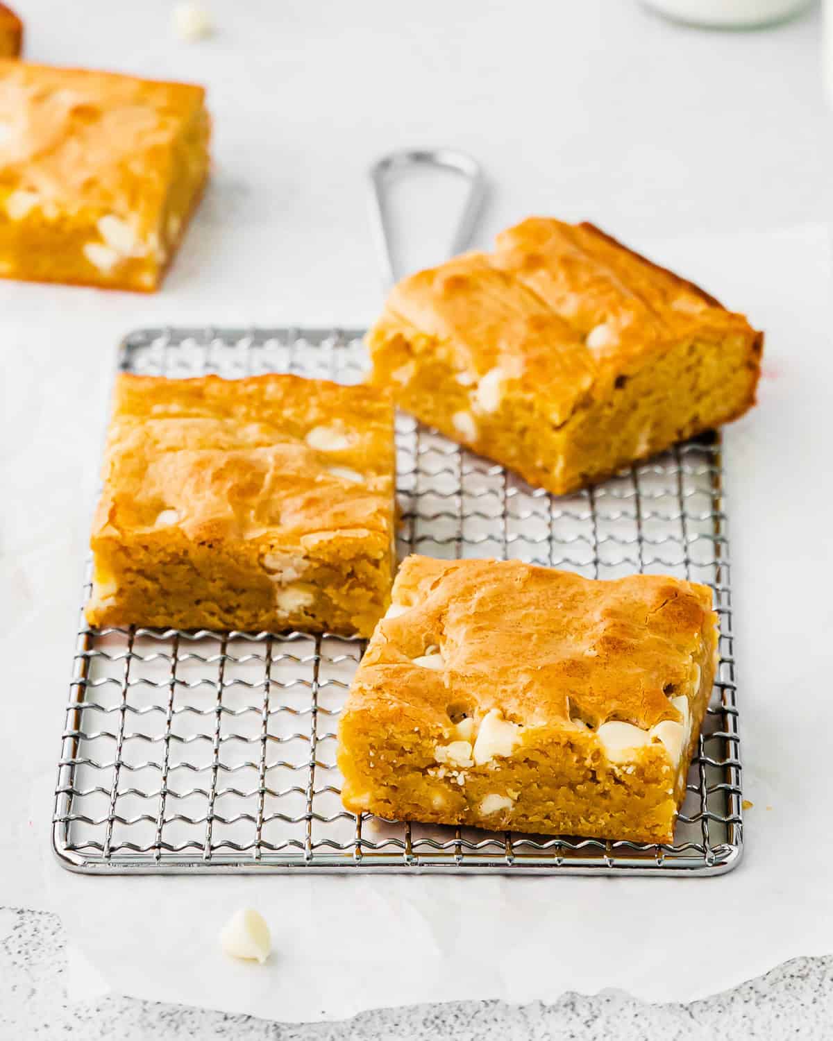Blondie bars arranged on a wire tray.