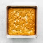 Baked blondie in a baking tin.