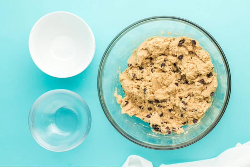 Chocolate chips folded in to cookie dough.