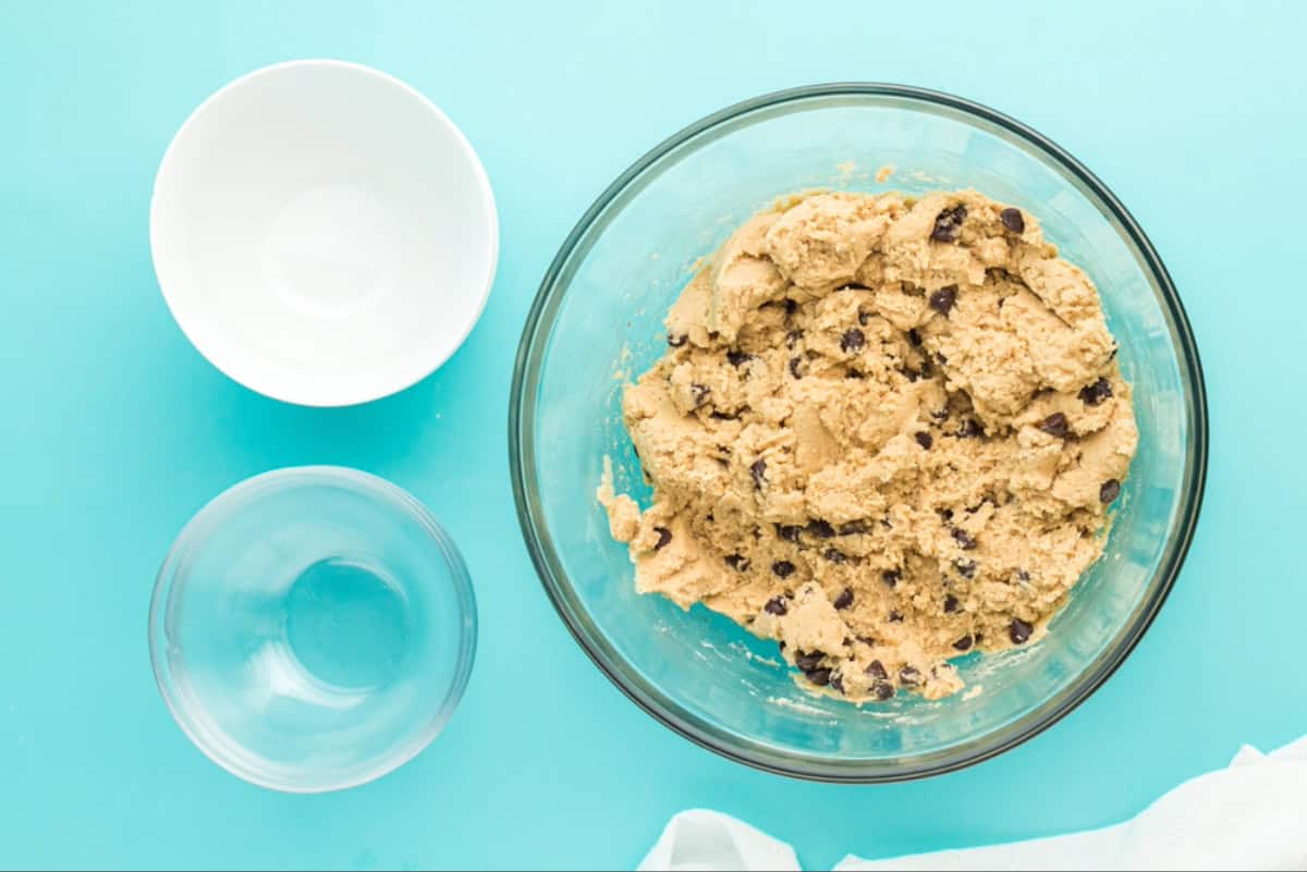 Chocolate chips folded in to cookie dough.