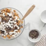 Chocolate chips and marshmallows stirred into the cereal.