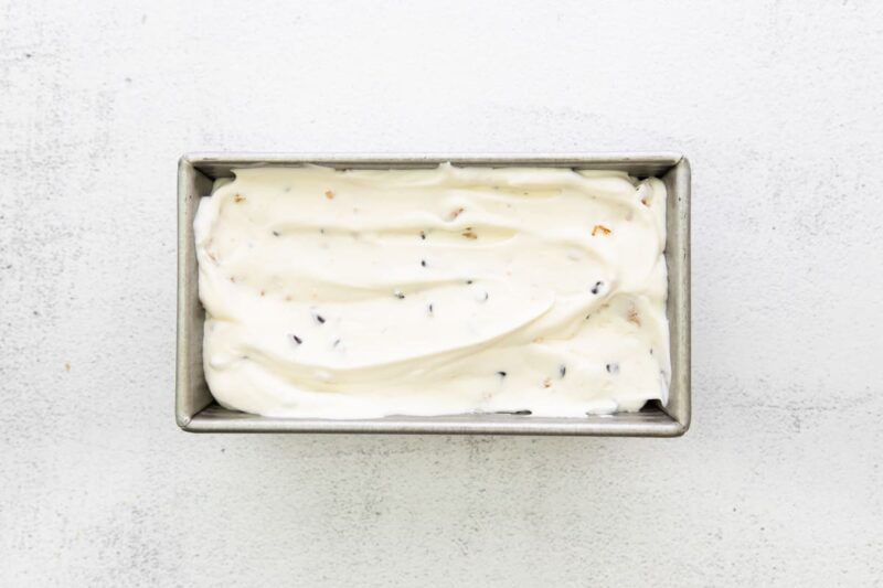 S'mores ice cream spread into a loaf pan to freeze.