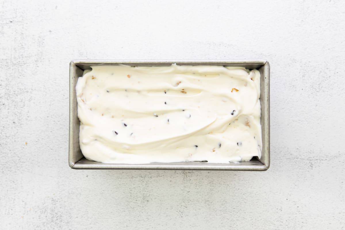 S'mores ice cream spread into a loaf pan to freeze.