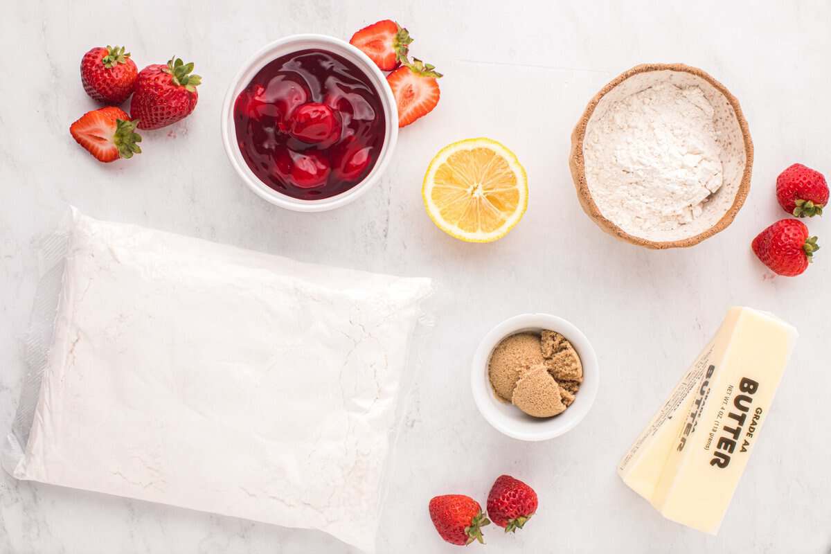 Ingredients for strawberry crumble bars include white cake mix, all-purpose flour, salted butter, strawberry pie filling, lemon juice, and light brown sugar.