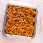 Caramel cornflake brownies in a baking dish.