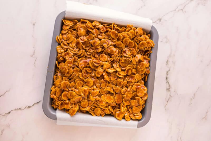 Caramel cornflake brownies in a baking dish.