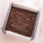 Brownies in a baking dish fresh out of the oven.