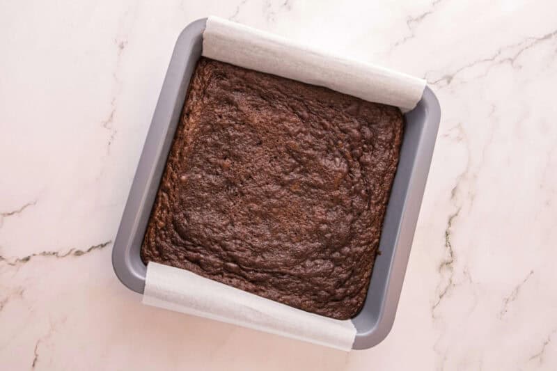 Brownies in a baking dish fresh out of the oven.