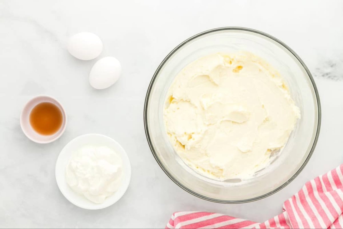 Cheesecake batter in a mixing bowl.