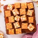 Peanut butter marshmallows squares on a serving board.