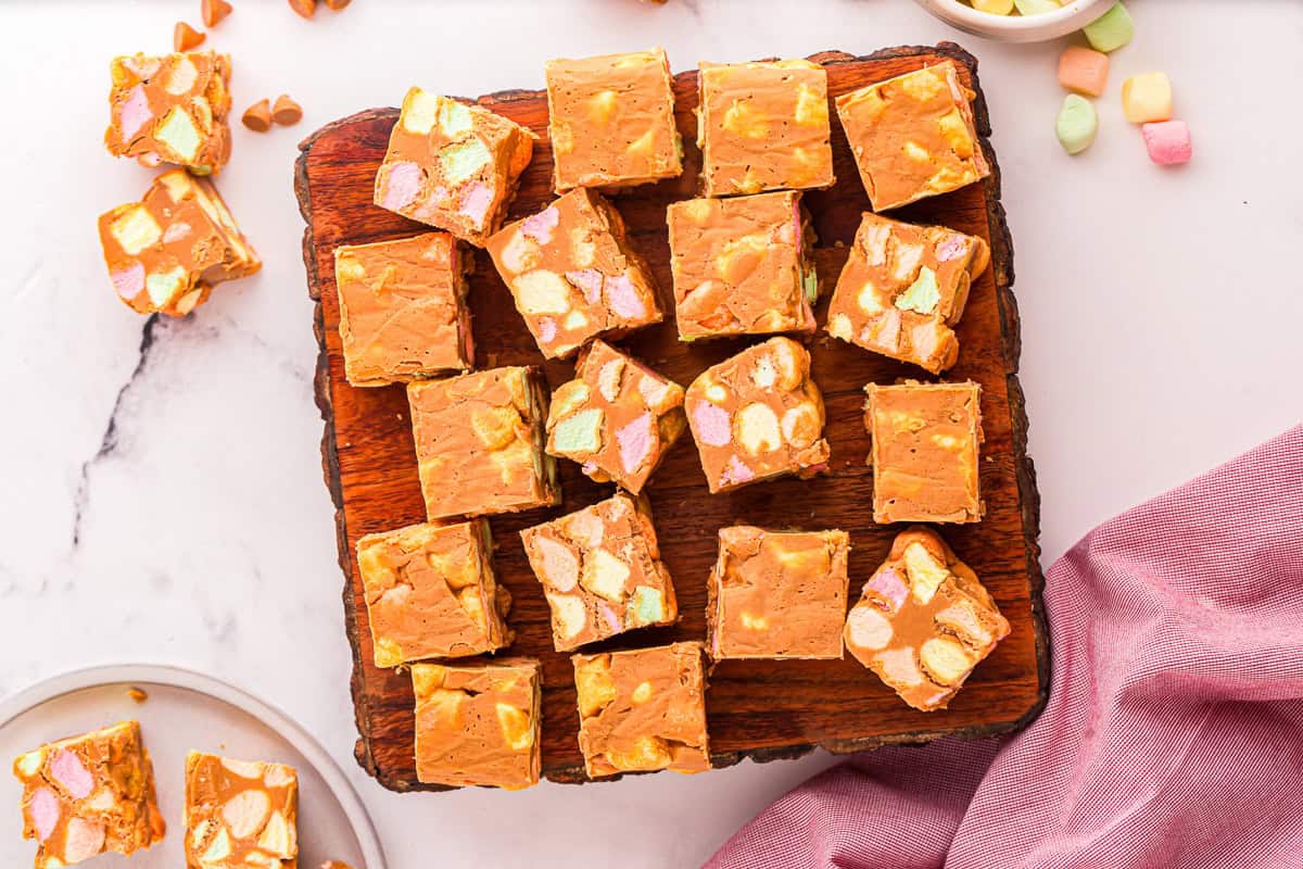 Peanut butter marshmallows squares on a serving board.