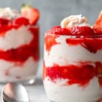 Layered strawberry fool in small dessert glasses.