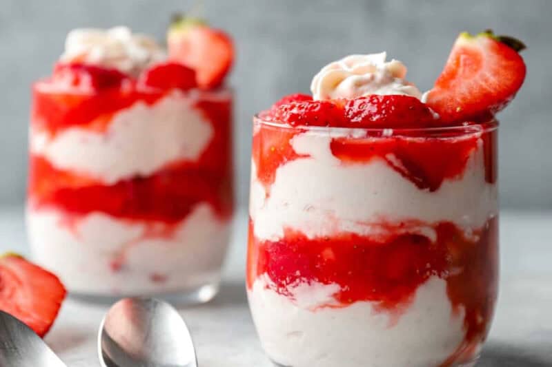 Layered strawberry fool in small dessert glasses.