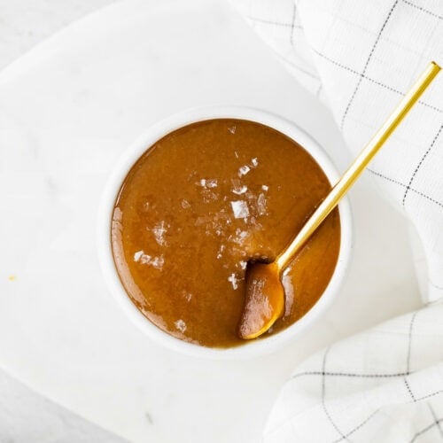 Dairy-free caramel sauce in a small dish.